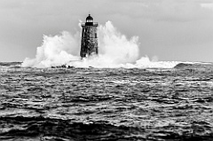 Giant Waves Break Around Whaleback Light in Maine -BW